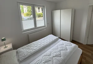 Schlafzimmer im Apartment in Refrath – Köln auf Zeit